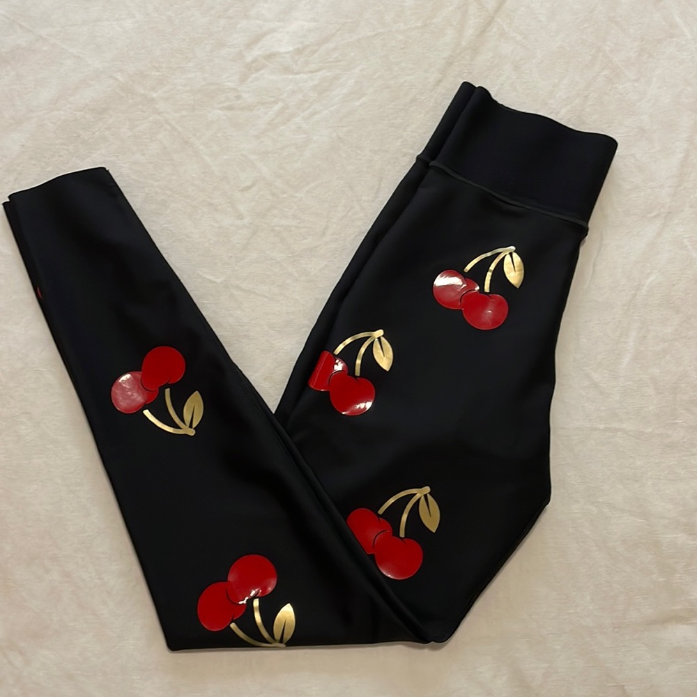 Ultracor elastic cherry leggings size XS like new !!